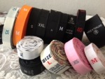 ป้ายไซส์ (size) - ผลิตป้ายติดเสื้อ - ปริ๊นซ์ ครีเอชั่น