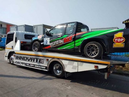 บริการขนย้ายเคลื่อนย้ายรถใหม่ป้ายแดง รถแข่ง นครปฐม - รถยกศาลายา อินโนเวทสไลด์คาร์