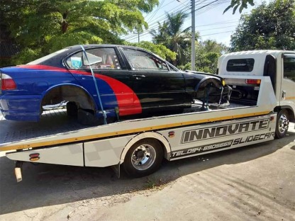 บริการรถสไลด์ออน นครปฐม เคลื่อนย้ายรถเสีย - รถยกศาลายา อินโนเวทสไลด์คาร์