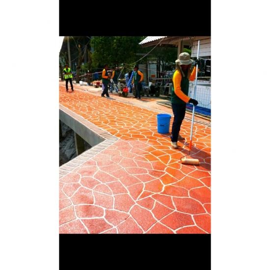 พื้นคอนกรีตพิมพ์ลายพ่นลาย  พิษณุโลก พื้นคอนกรีตพิมพ์ลายพ่นลาย สีส้มเส้นขาว พิษณุโลก 