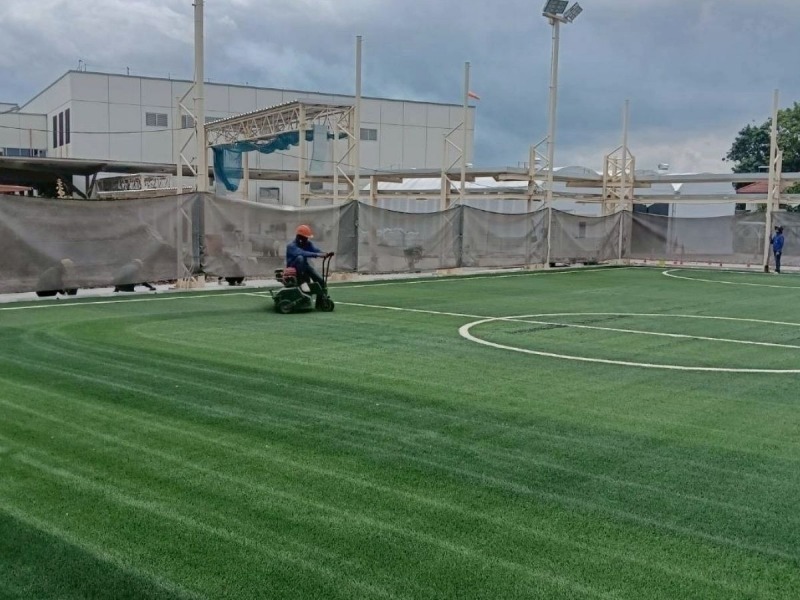 การปรับพื้นหญ้าเทียม