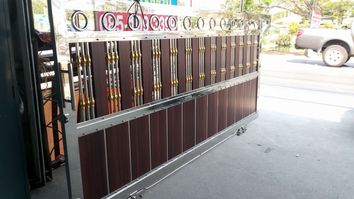 ประตูรั้วสแตนเลสลายไม้ ปทุมธานี ประตูรั้วสแตนเลสลายไม้ ปทุมธานี